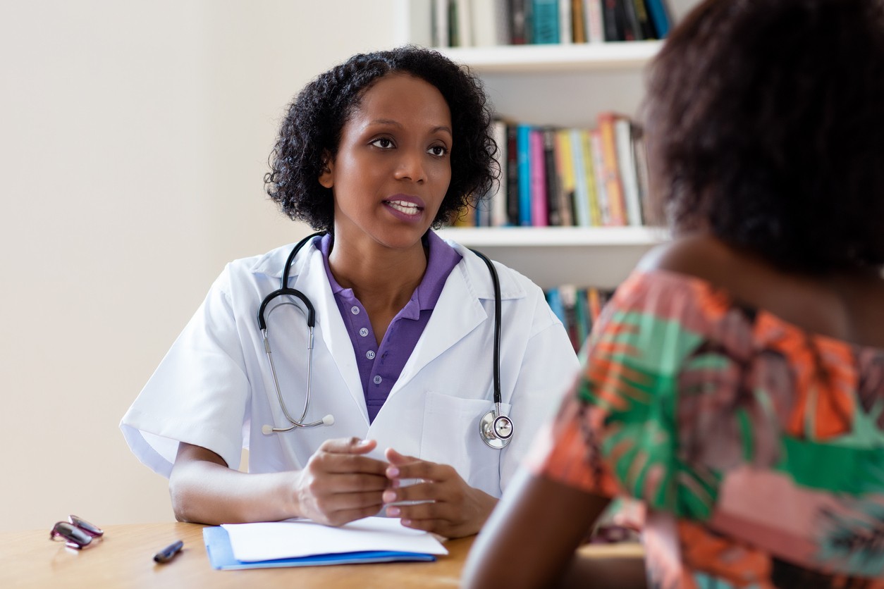 primary care physician speaking to a patient
